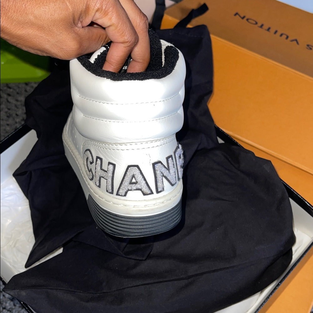 CHANEL White and Black High-Top Sneakers